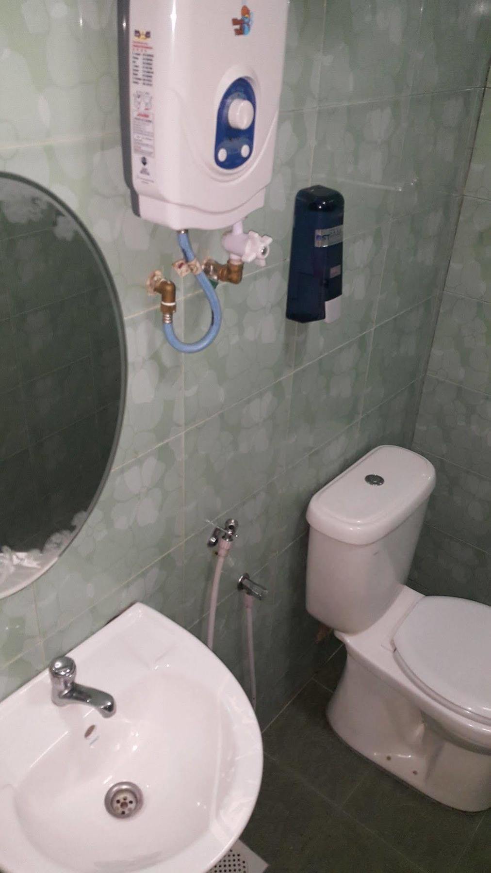Oyo 301 River Inn Hotel Butterworth Extérieur photo